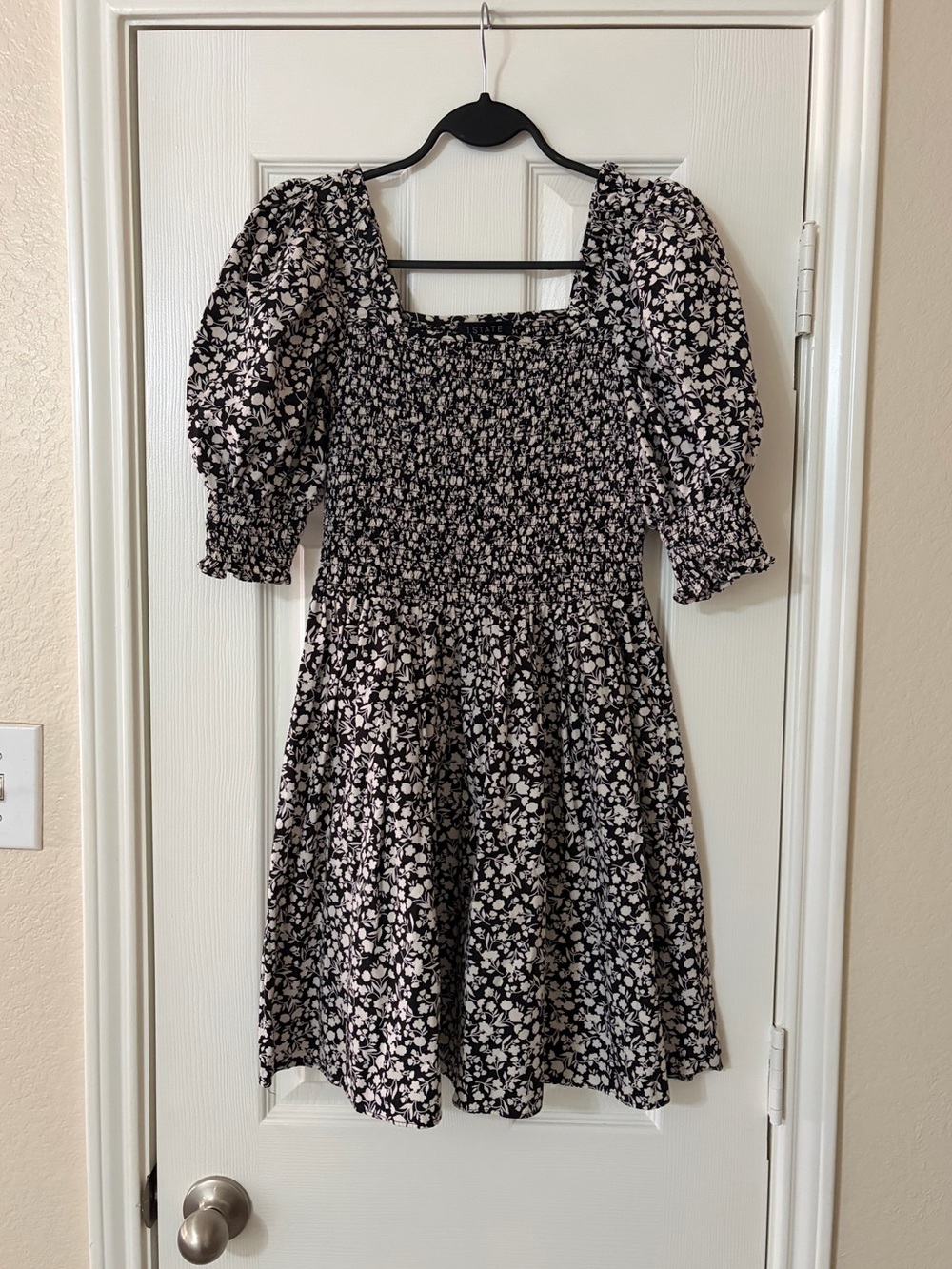 1. State Black and White Floral Smocked Mini Dress